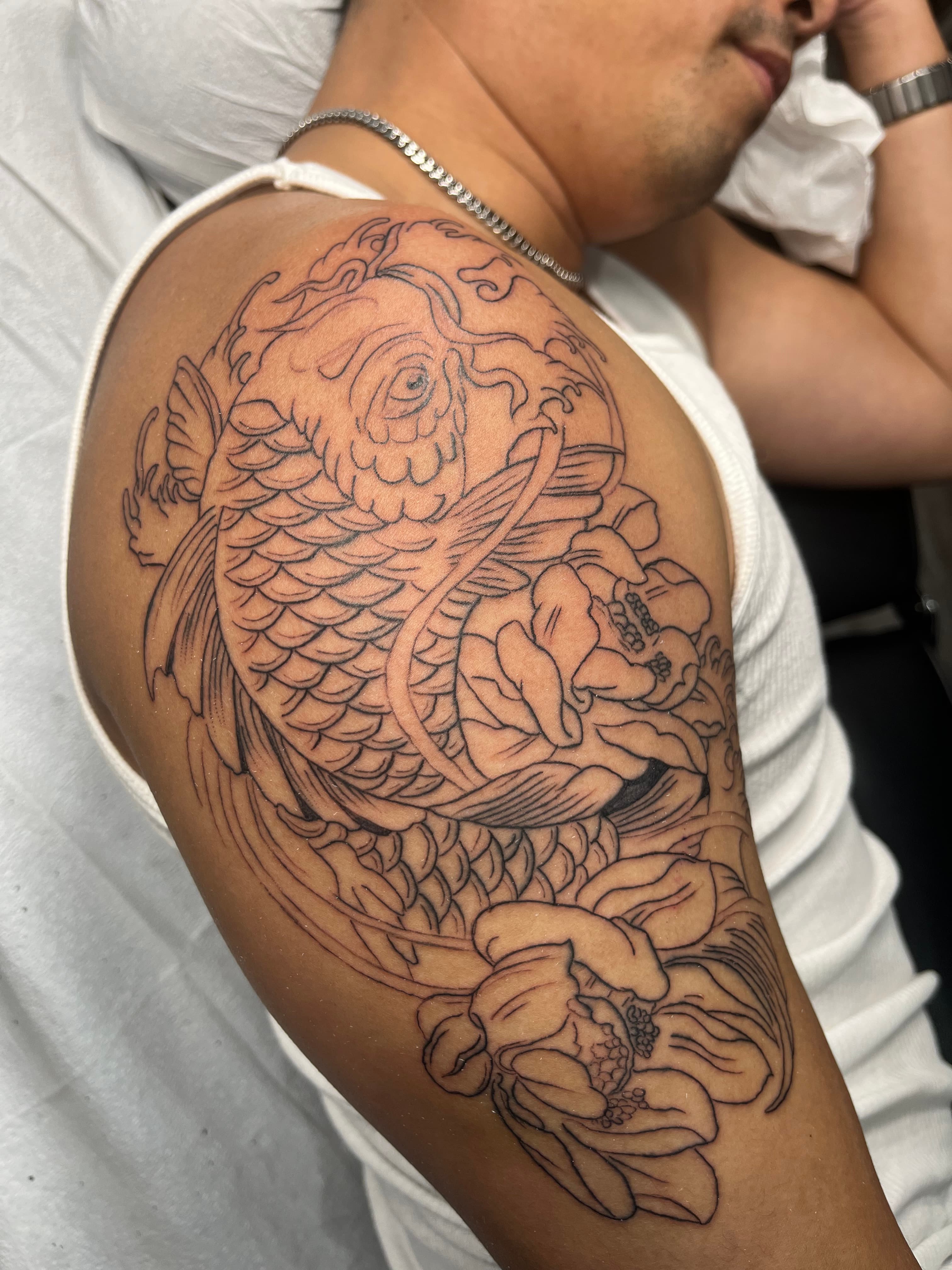 Koi fish with lotus flower tattoo Asian art custom design by Tony Luong Maple Valley WA